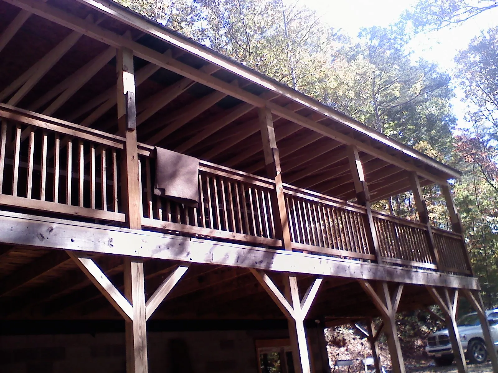 Timber framing under a new elevated porch and deck — Roof Leak Repair in Osawatomie by Roofing Brothers